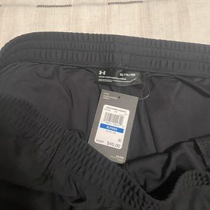 Under Armor XL track pants  new with tags !   BOTH for $30!!!!